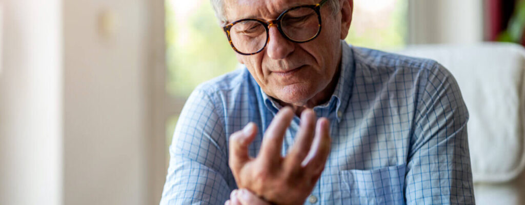 An old man with Arthritis pain